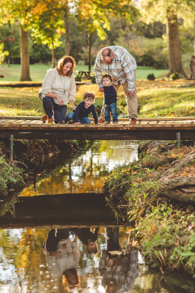 Grandparents with grandchildren at creek in Elizabethtown, KY